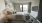 a bedroom with a large window