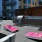 a patio with tables and chairs