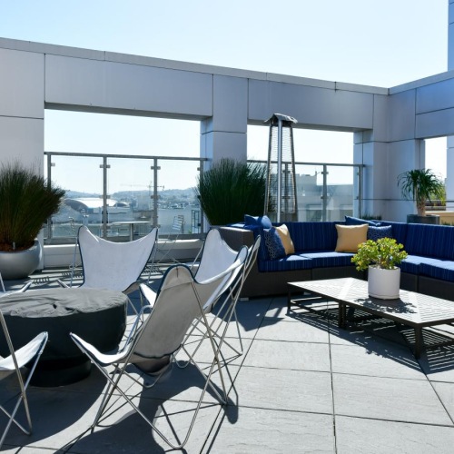 Take advantage of all Venn on Market has to offer a patio with chairs and a table