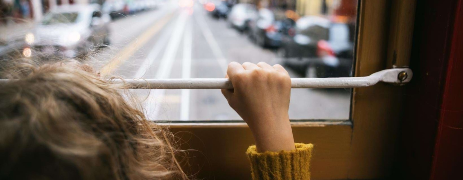 a person looking out a window