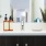 a bathroom counter with a sink and a mirror