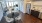 a kitchen with a table and chairs