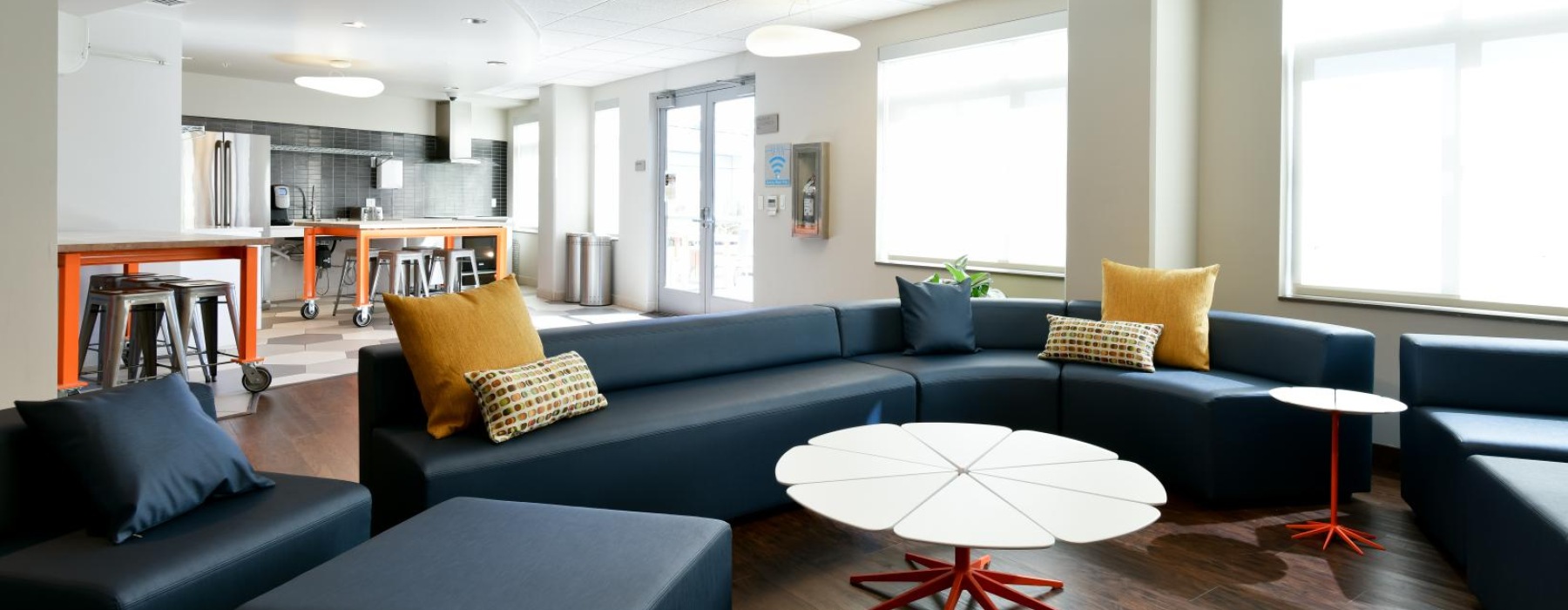 a living room with a blue couch