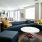 a living room with a blue couch