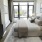 a bedroom with a large window