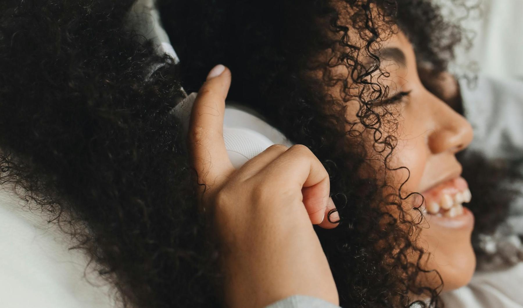 a person with their hand on the face